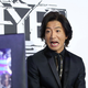 Kimura makes a funny face as he plays the game.